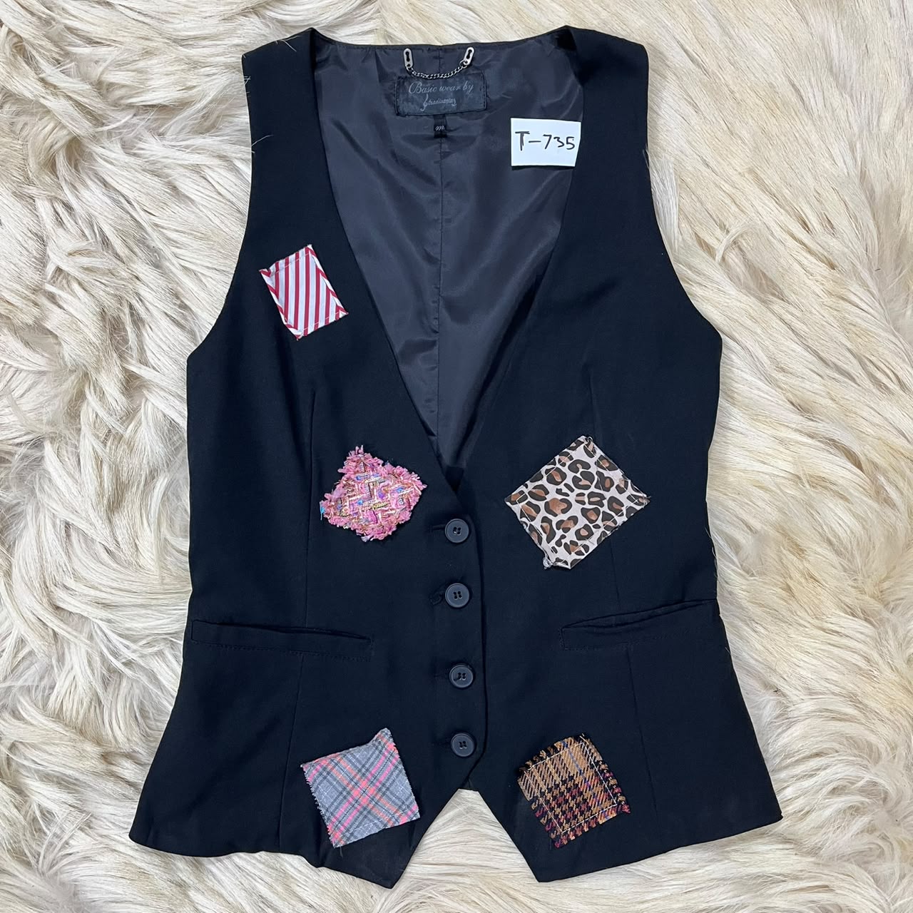 sleeveless black vest