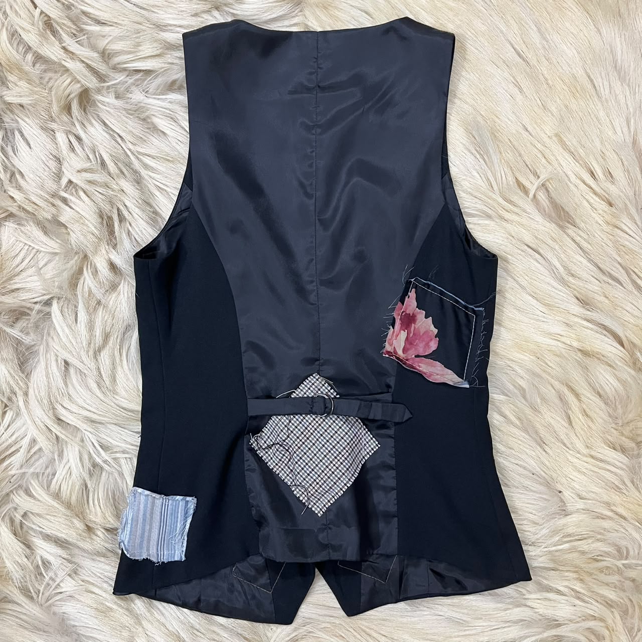 sleeveless black vest