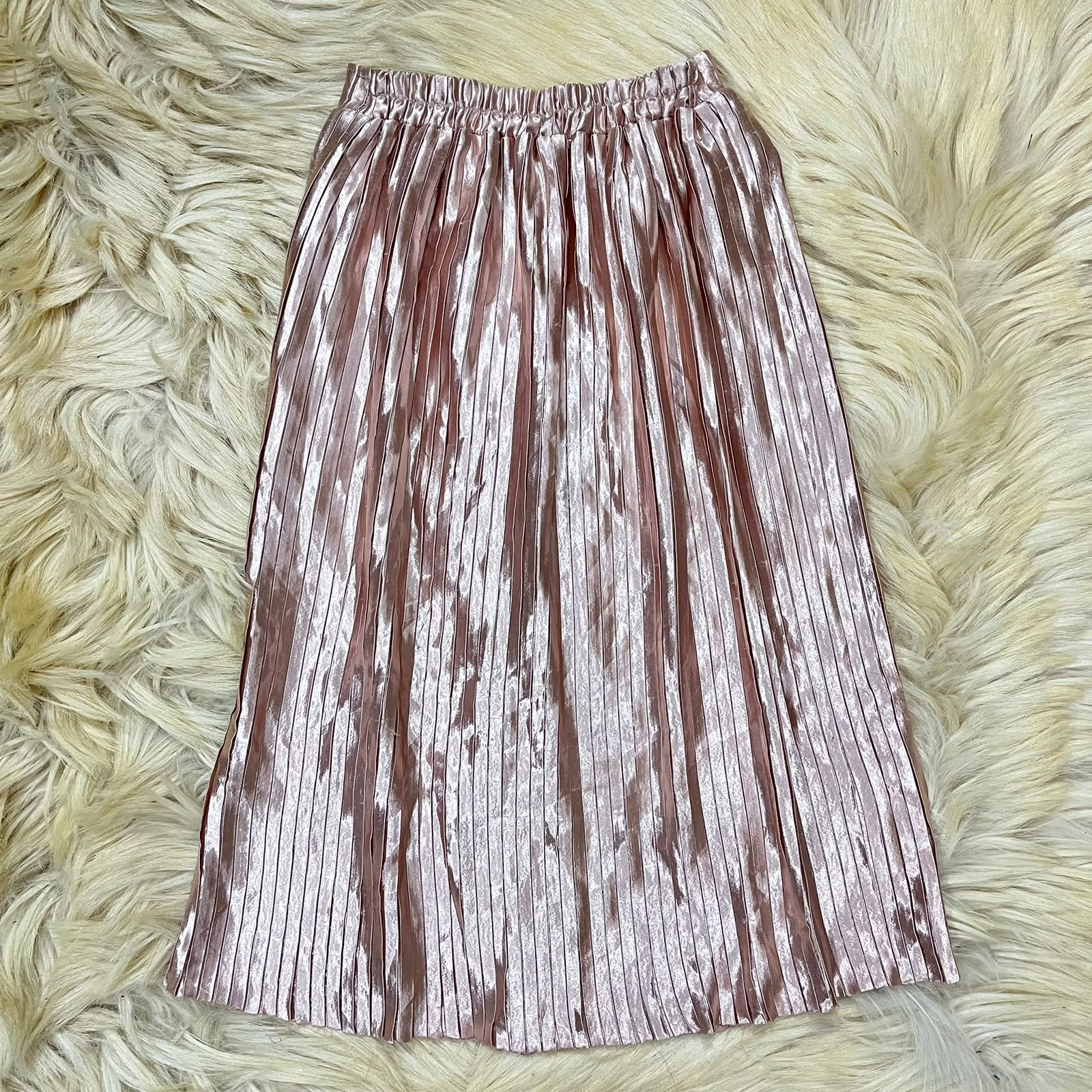 Metallic rose gold pleated midi skirt