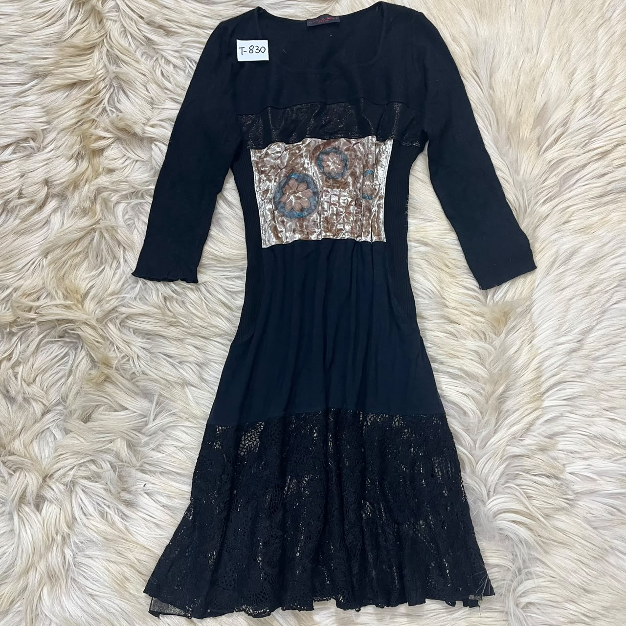 Black long-sleeve midi dress with a lace-trimmed waist